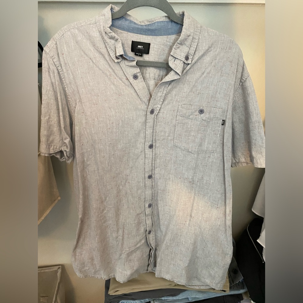 Obey button up shirt. Grey with red design. Good condition